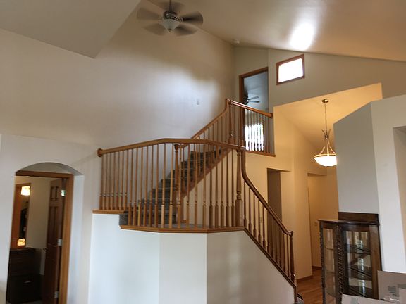 Great room has vaulted ceilings. One master suite is on mai
