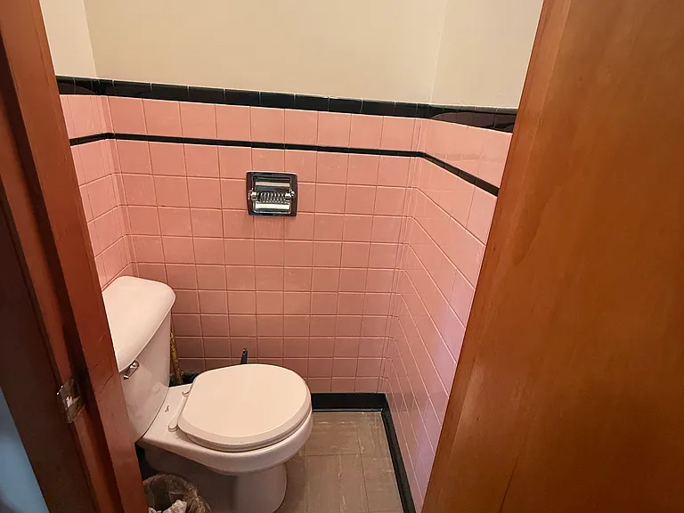 Water closet off the laundry room.