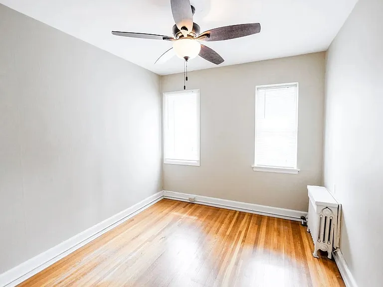 Welcome to Central Lakes of Uptown, where modern living meets comfort. This charming room features elegant hardwood floors, ample natural light, and a ceiling fan for your convenience. Explore stylish living todayschedule a tour now!