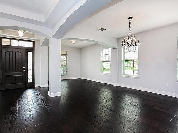 Entrance foyer, formal living & dining rooms.