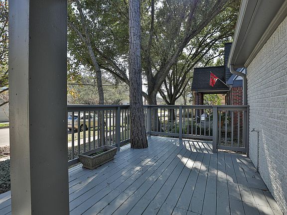 Large decked front porch.
