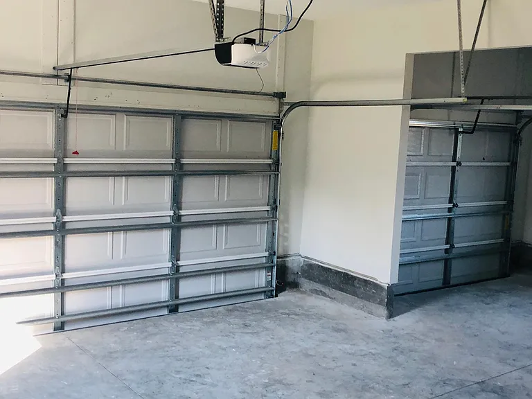 3 car garage or 2 cars and a golf cart