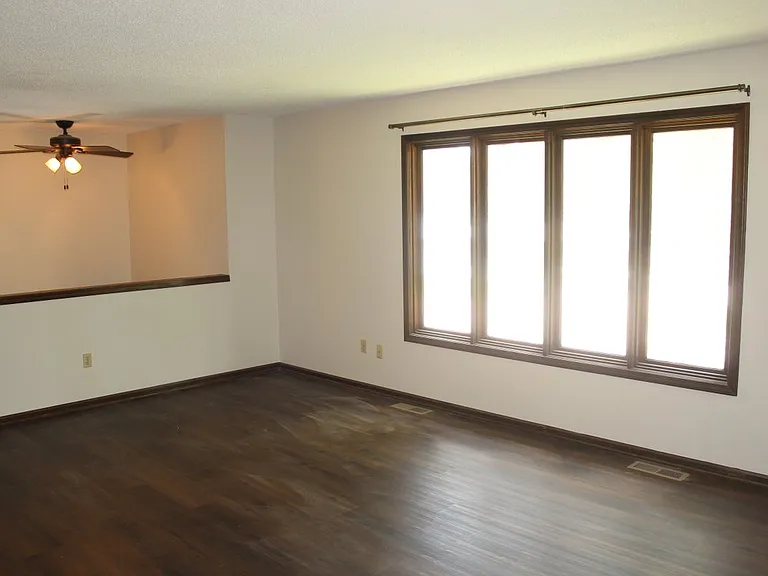 Lots of Natural Lighting upstairs in the Living Room area