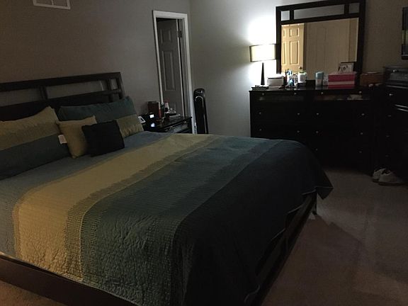 Large Master with his and her closets and master bath. Brig