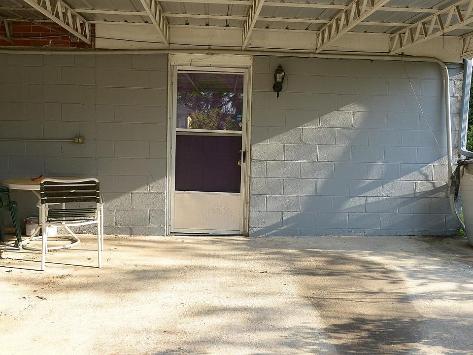 Exterior door way and carport
