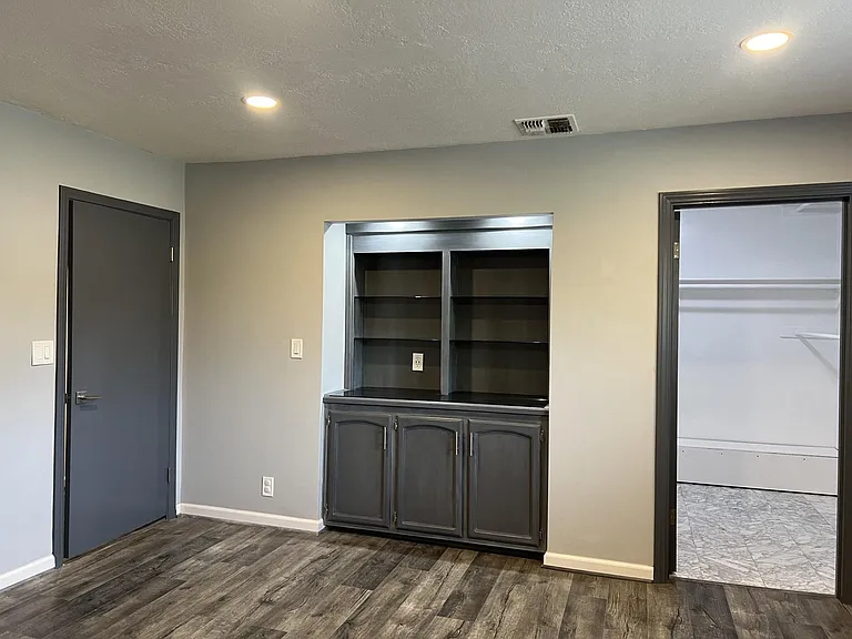 Master bedroom built in shelves and cabinets