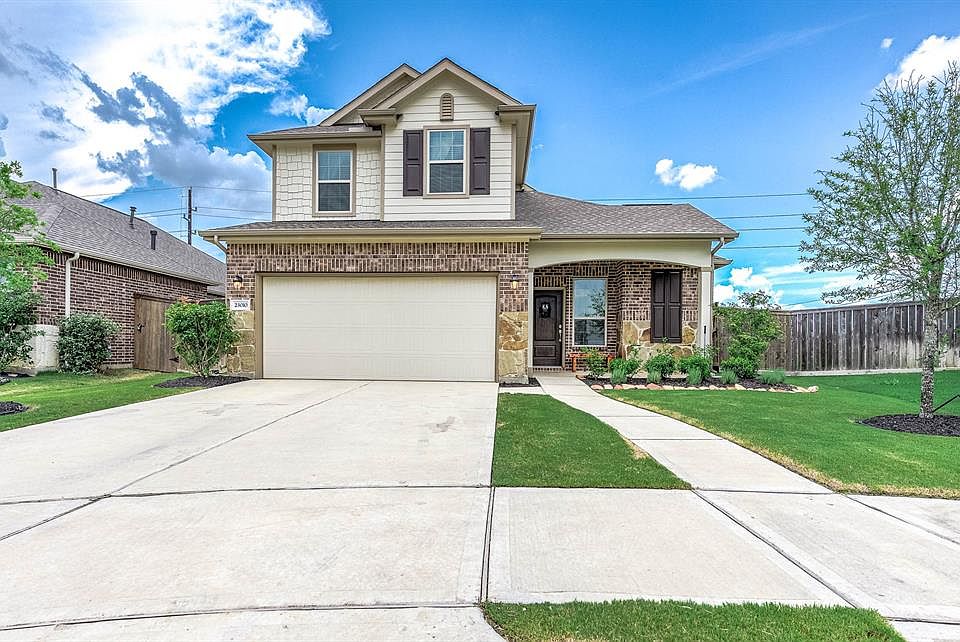 Welcome home to 23010 Tindarey Falls Lane!