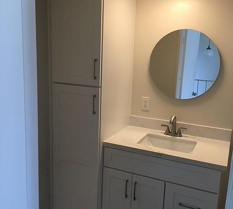 new updated bathroom vanity w/ shaker cabinets