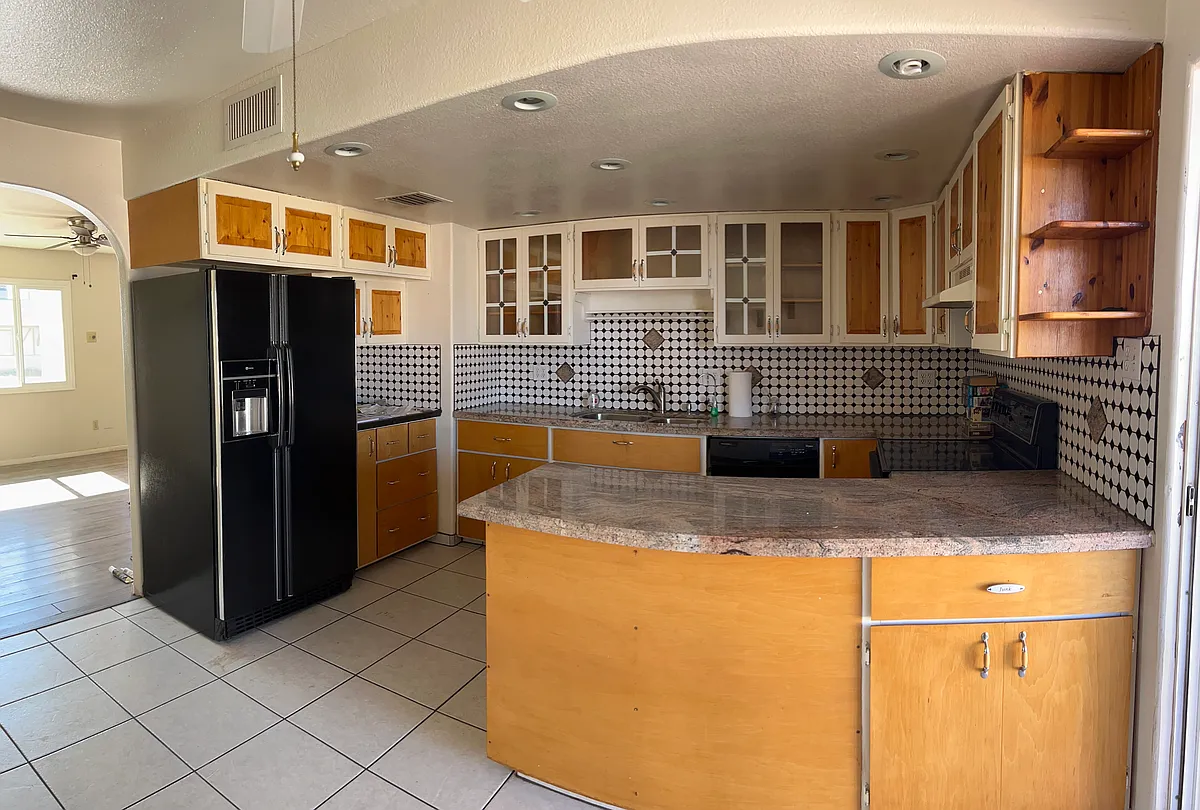 Eat-In Kitchen, granite counter tops with sliding door to covered porch - 5322 W Saint Moritz Ln