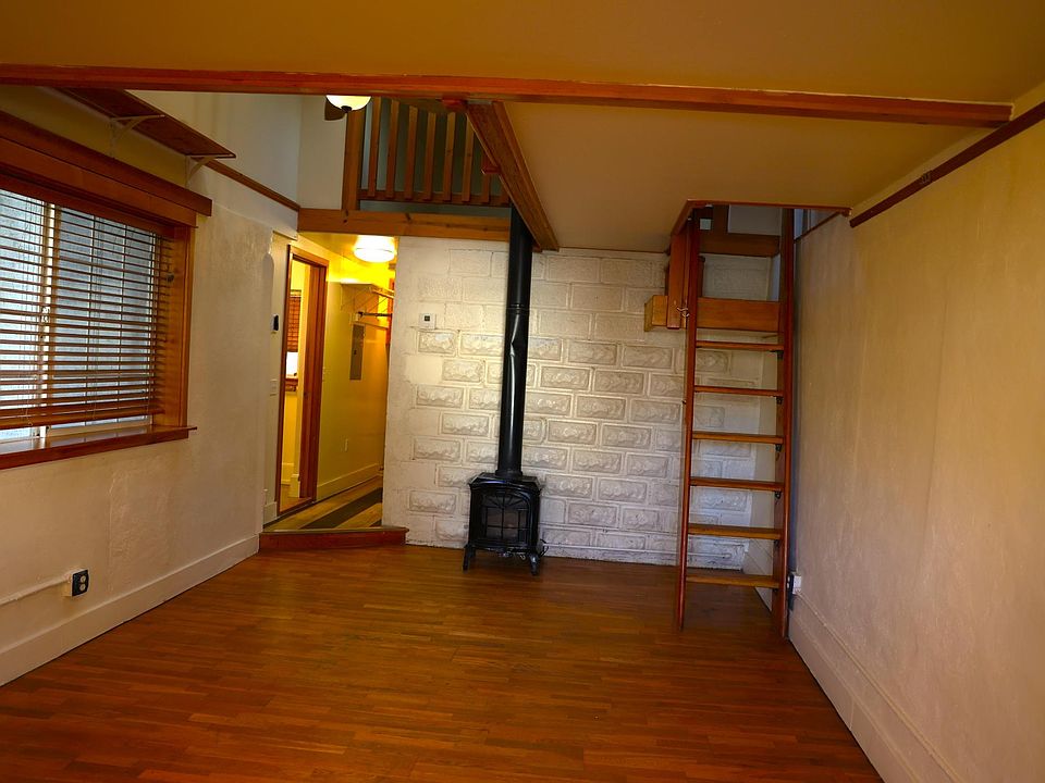 Living Room with Captain's Ladder and Atrium