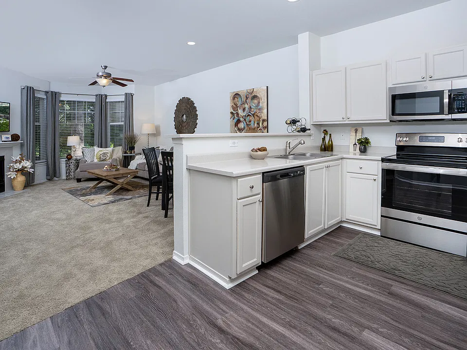 Open-concept floor plans create a seamless flow between the kitchen, dining, and living areas