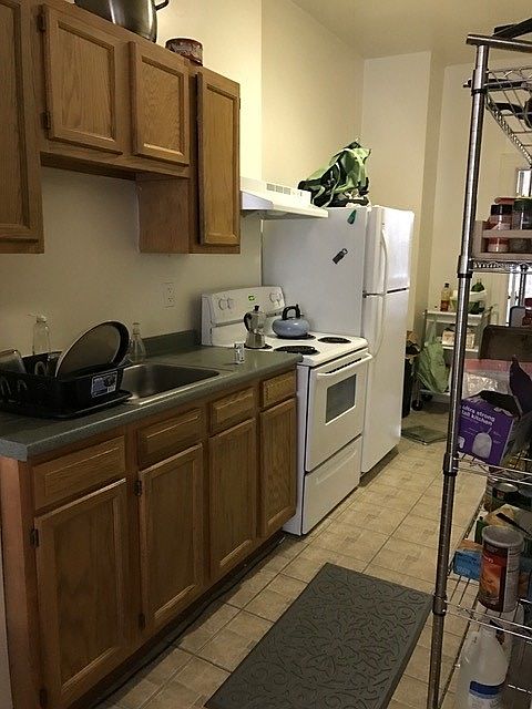 Updated kitchen with ample cabinet and counter space.