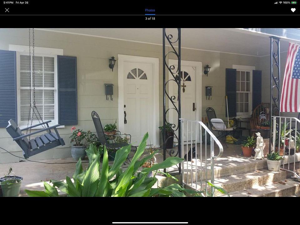 Nice front porch. Nicely shaded by 2 magnolia trees.