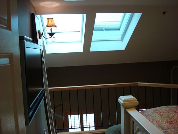 Bedroom with walk-in closet; mez/n