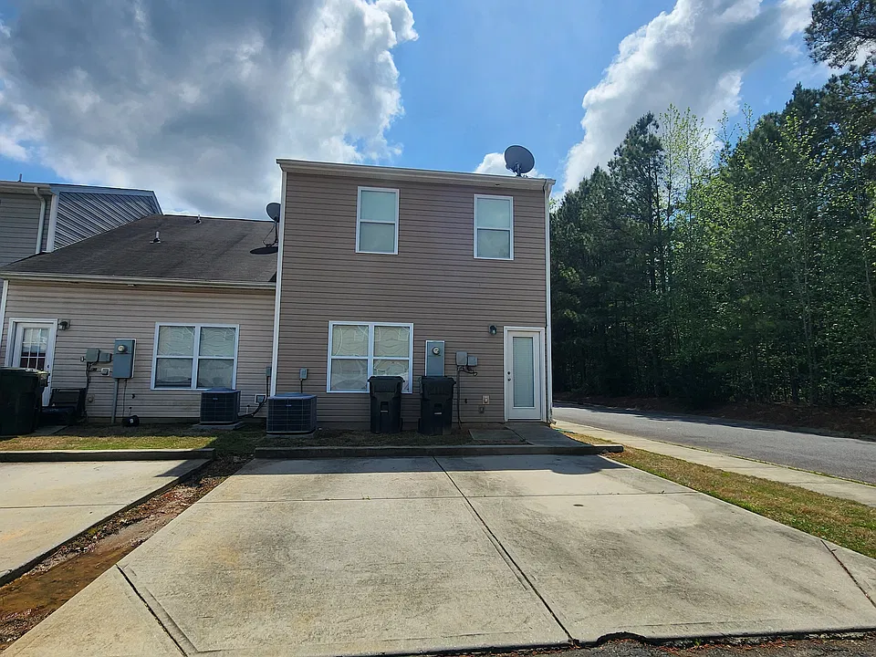 Rear of Townhome with 2 parking spaces. 3BR/2BA!