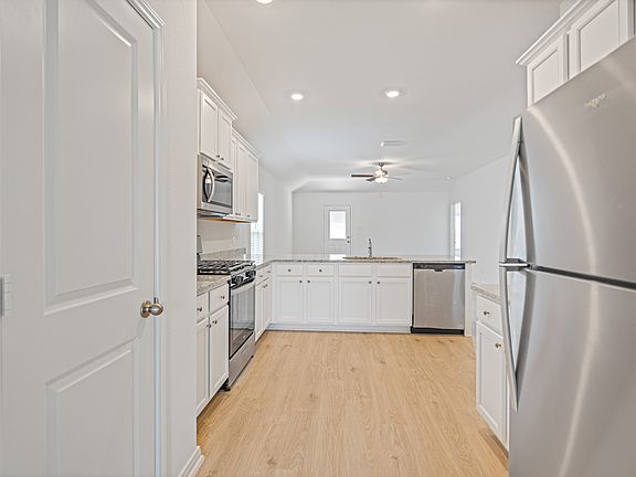 The spacious kitchen is perfect for preparing your family s favorite meals and treats.