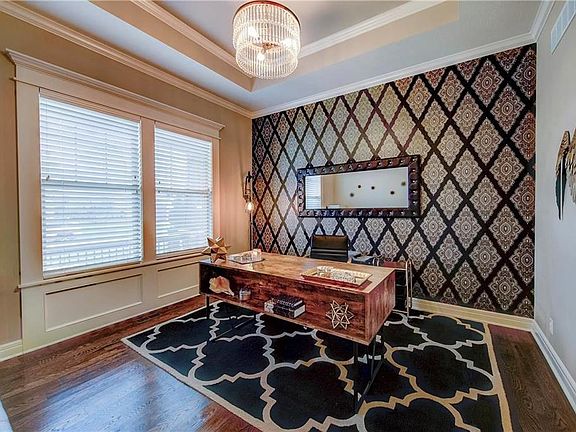 Office or 6th bedroom on the main floor has large walk-in closet.