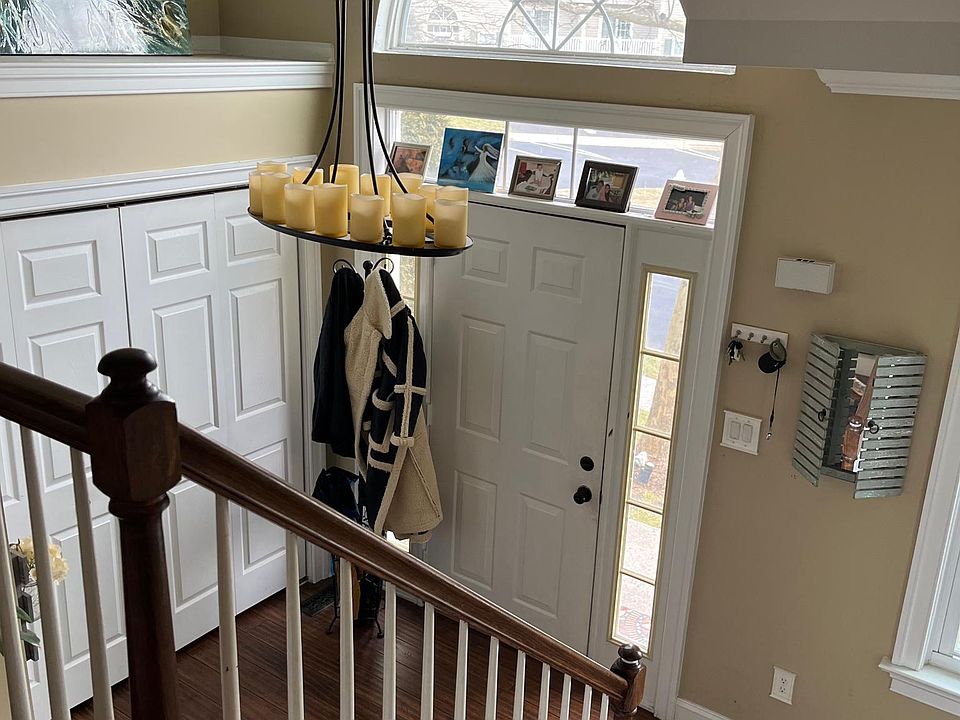 There is half bath in the entry way.
