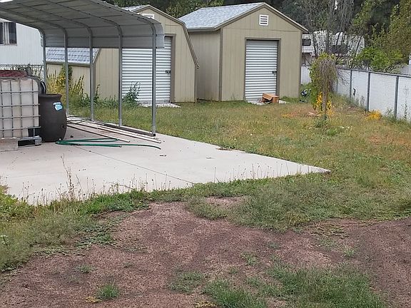 2 sheds and carport