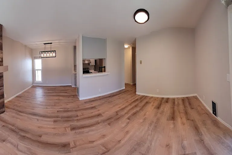 Wide view of living room & balcony