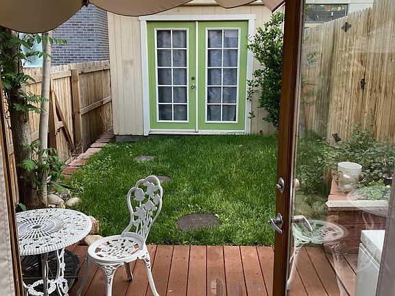 Deck and Small Fenced Back Yard