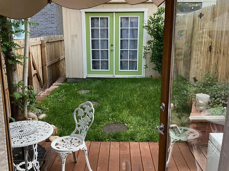 Deck and Small Fenced Back Yard