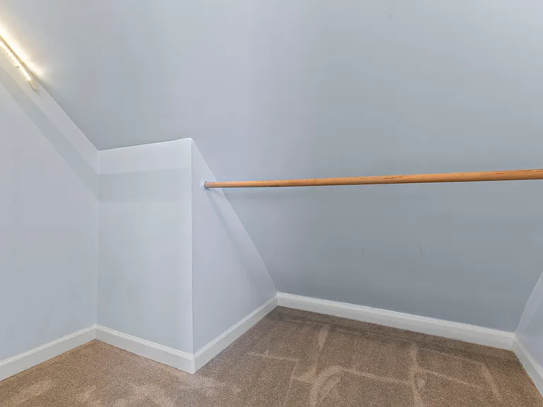 Front Bedroom Walk-in closet with individual lighting