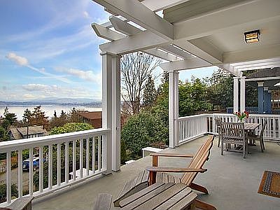 Large view porch with views of Lk Washington and the Cascade mountains