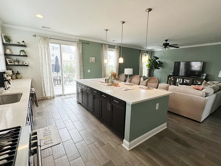 Bright, open kitchen with plenty of cabinets and counter space!