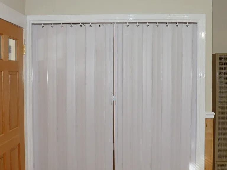 Accordion doors to sleeping alcove