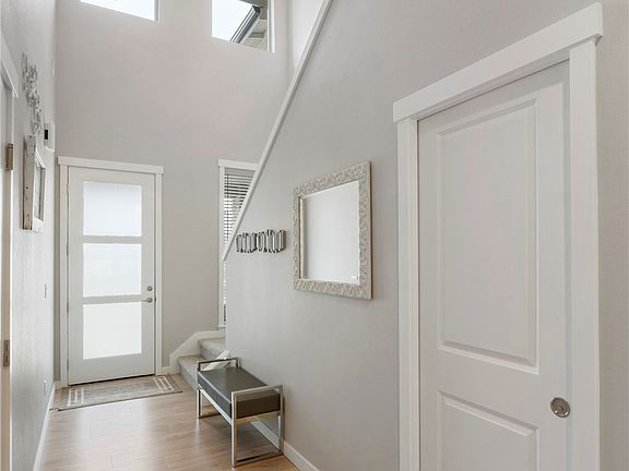 A view looking back at the entrance. Natural light filling the room!>