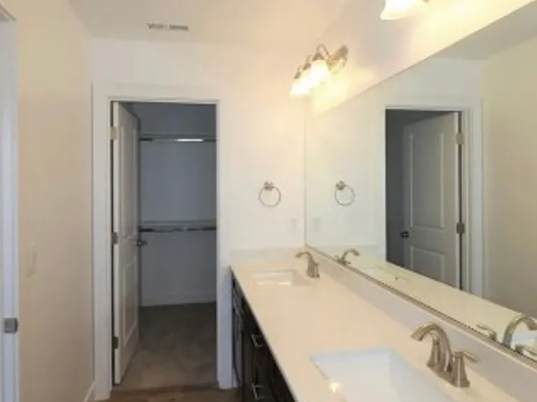 Master bathroom (walk-in closet view)