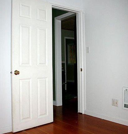 first of two bedrooms - enjoy stunning hardwood floors in both.