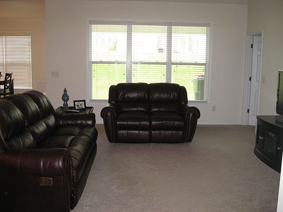 Living Room w/ Vaulted Ceilings