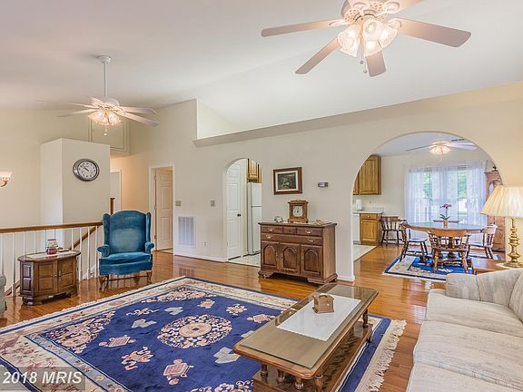 Living Room Open Shot Into Dining and Kitchen.