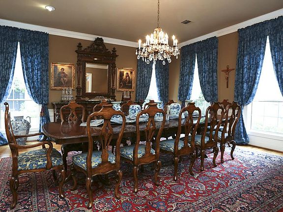 Large dining room with windows on two sides