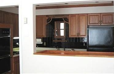 View of custom kitchen from living room