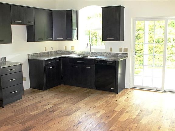 Kitchen with sliding doors to the covered patio.