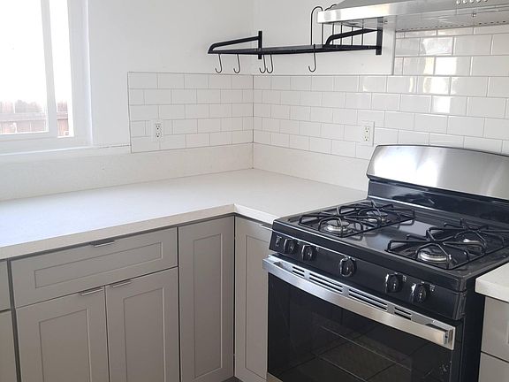 Brand new kitchen with all new appliances including dishwasher and garbage disposal. Water filter hook-ups in sink.