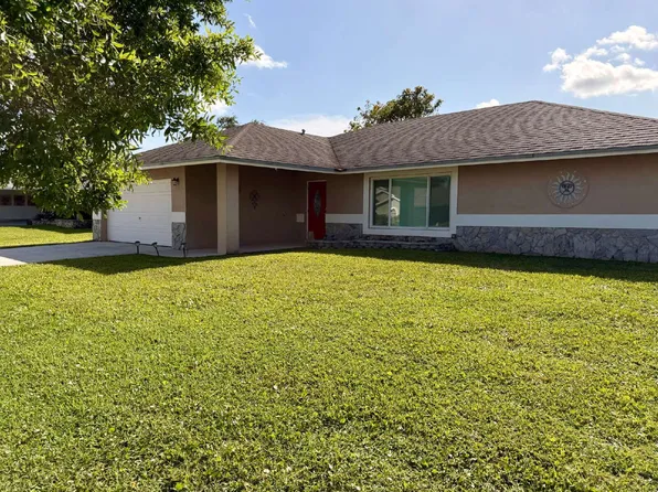 147 Sunflower Cir, Royal Palm Beach, FL 33411