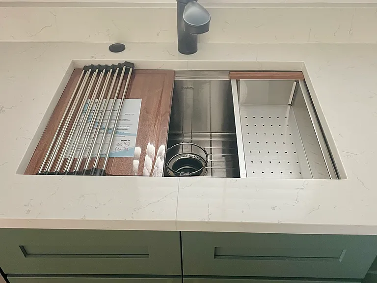 Brand new sink and hardware with new shudders on the windows.