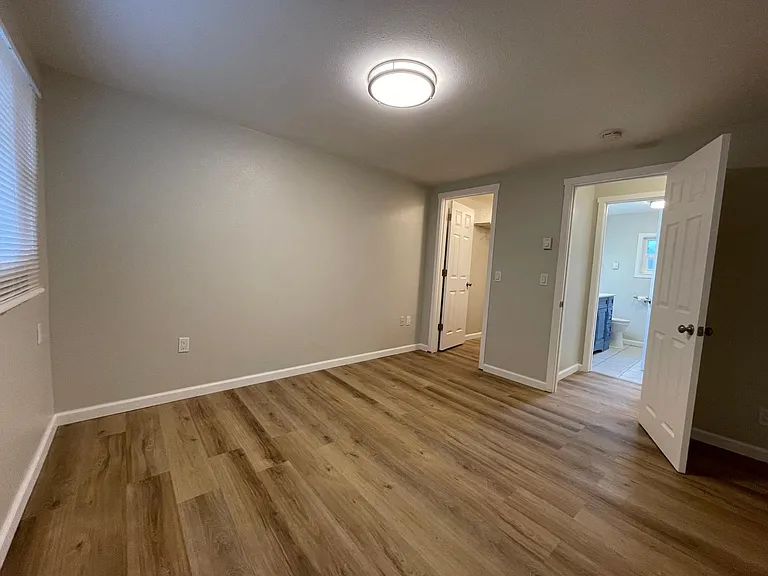 Bedroom #2 left side with walk in closet