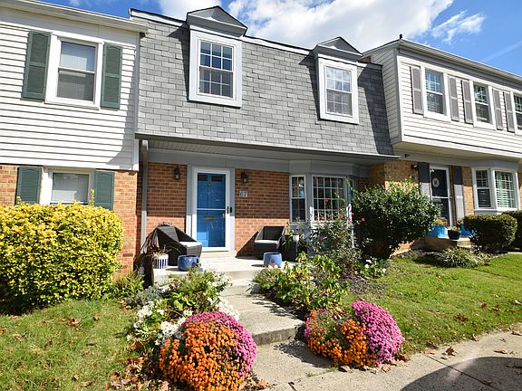 Three finished levels, with w/four bedrooms up, 3.5 baths, a gourmet kitchen, and a fenced-in yard.