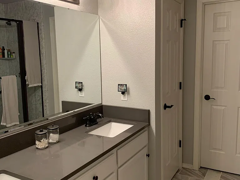 Primary bathroom, double vanity, shower, walk in closet, lots of storage