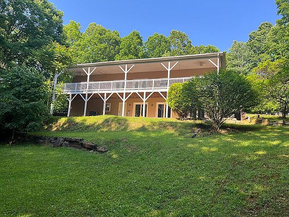 Back of house. 10x64' patios