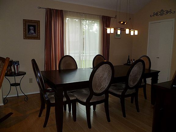 Formal Dining area with accent drapery.