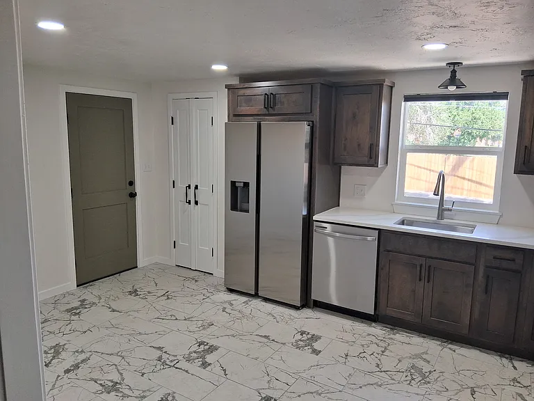 1504 Zuni Rd — Photo 4