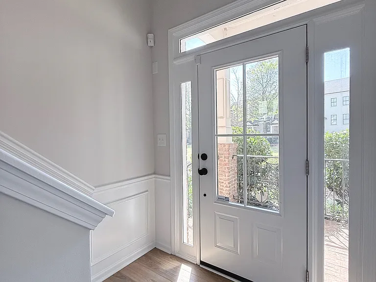 Split level entrance with 17 ft vault ceilings at entrance.