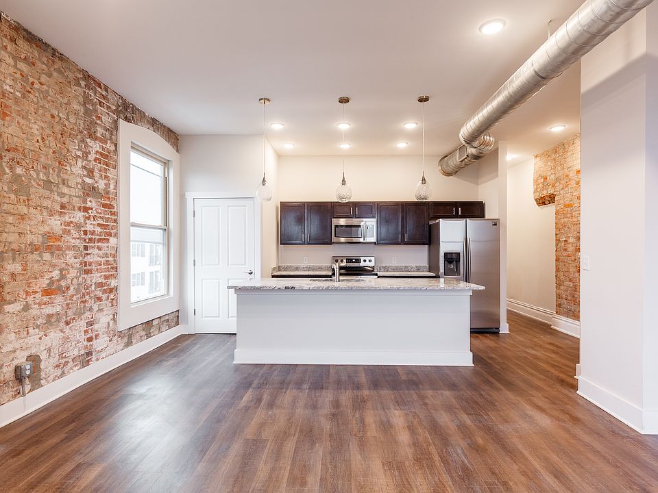 Great open floor plan with easy care Luxury vinyl plank flooring, high ceilings, lots of light from large windows. In unit equipped laundry.