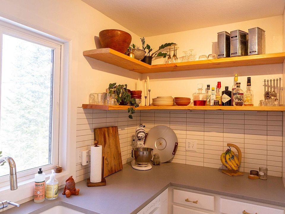 Beautiful kitchen with upper, open shelving, new appliances